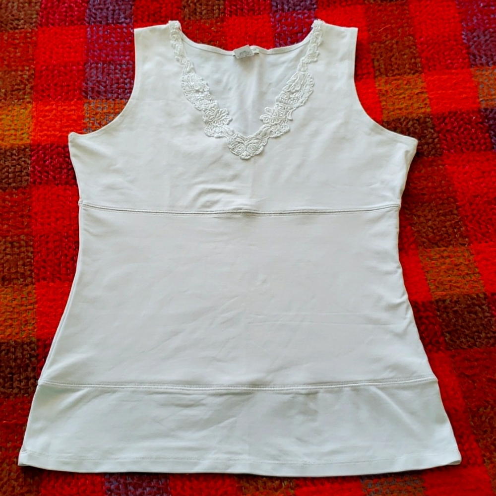 White top with double layer in tummy area